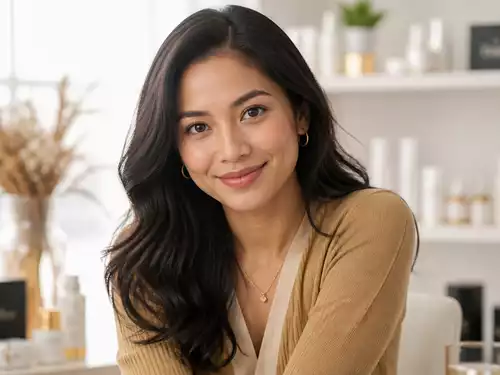 Confident Filipina woman representing the ElPira Beauty publishing brand